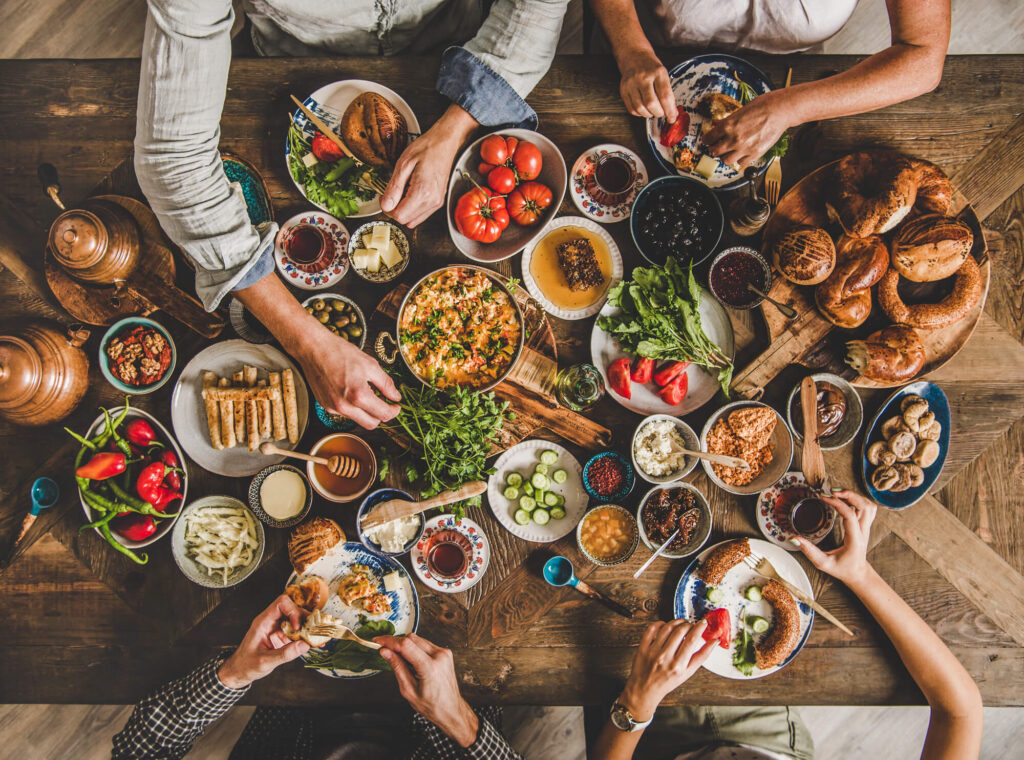 Flat lay of Turkish family during traditional Middle Eastern breakfast